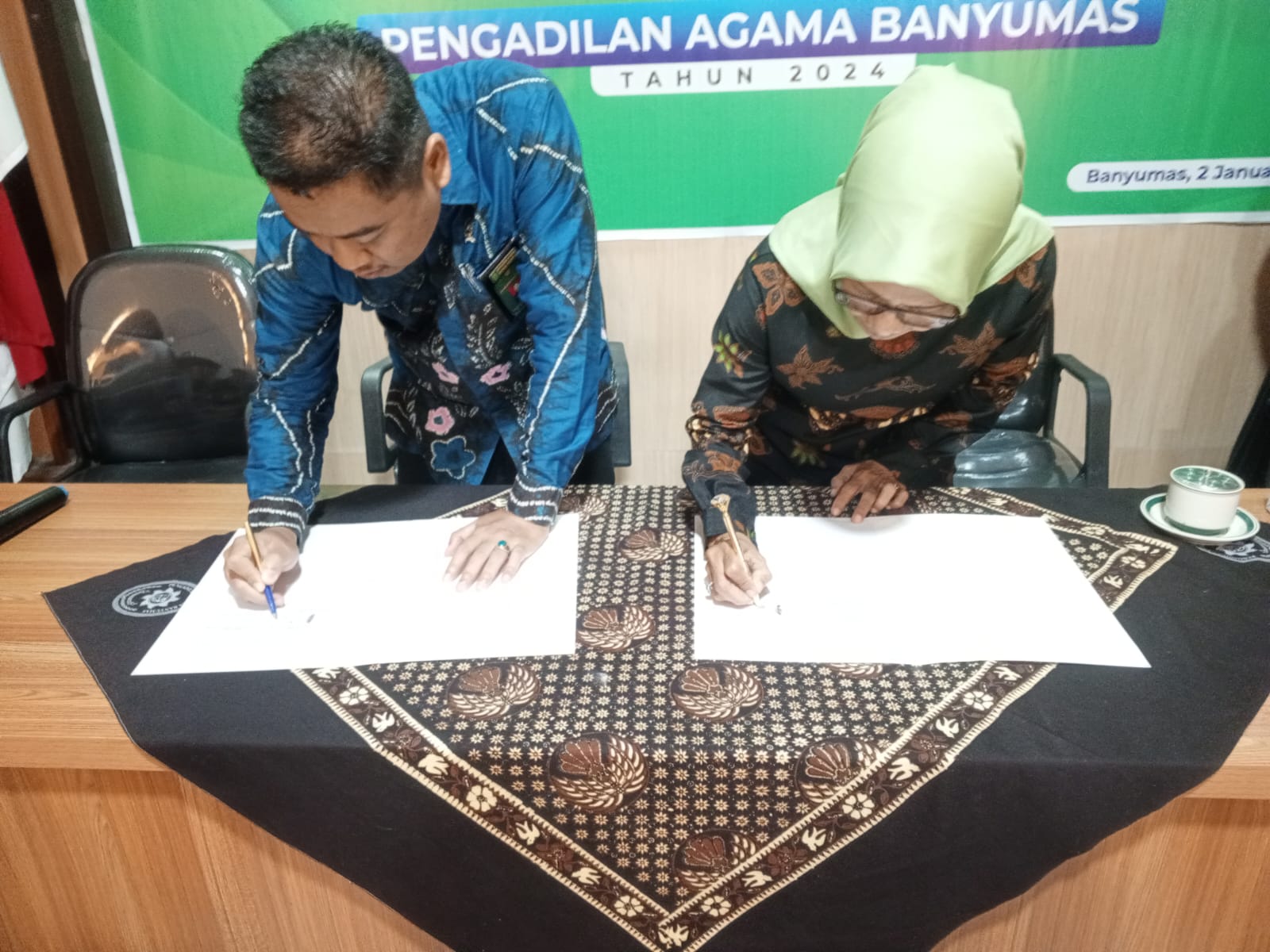 MoU Posbakum1